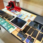 alt="UAE Police Bust Major Phone Scam Ring, 15 Arrested in Ajman"