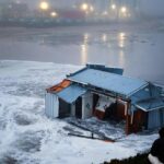 alt="Pier Breaks Off and Floats Away in California Storm"