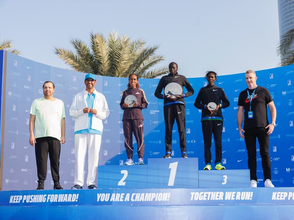 alt="Ethiopian Regasa and Kenyan Amanang’ole Shine at Abu Dhabi Marathon"