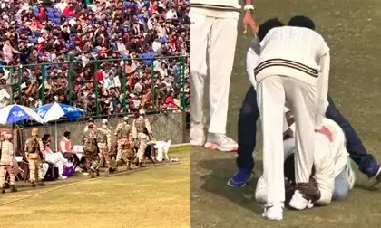 alt="Ranji Trophy: Virat Kohli Meets Fan After Security Breach During Match"