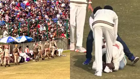 alt="Ranji Trophy: Virat Kohli Meets Fan After Security Breach During Match"