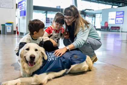 alt="Meet Dino: The Therapy Dog Easing Travel Anxiety at North Macedonia’s Airport"