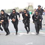 alt="Dubai Police Deploys 128 Patrols, Including 18 Female Units, for UAE Tour Women 2025"