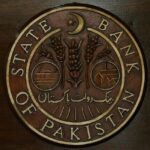 alt="Pakistan Keeps Key Rate Unchanged at 12% for First Time in a Year"