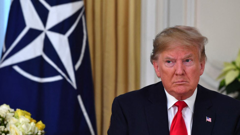 alt="Trump Asks if NATO Defense Pledge Will Hold, Raising Global Fears"