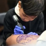 alt="9-Year-Old Thai Tattoo Prodigy Turns Passion for Art Into Craft"