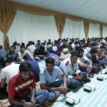 alt="Young Volunteers Steal the Limelight at Al Sajaa Labour Park's Community Iftar Drive"