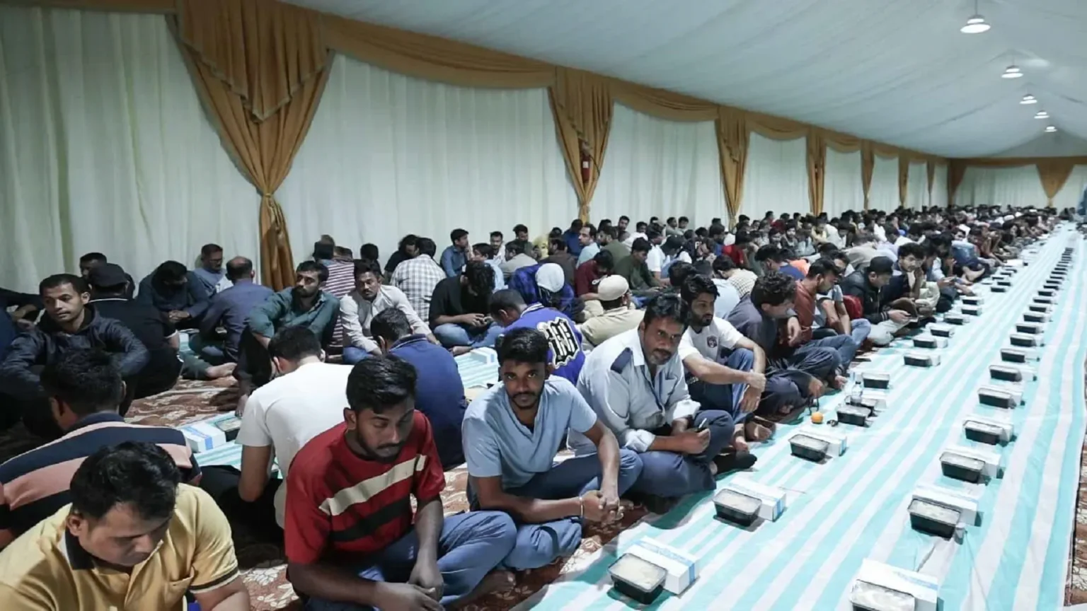 alt="Young Volunteers Steal the Limelight at Al Sajaa Labour Park's Community Iftar Drive"