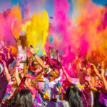 alt="Varanasi Celebrates Holi with Colors and Music"