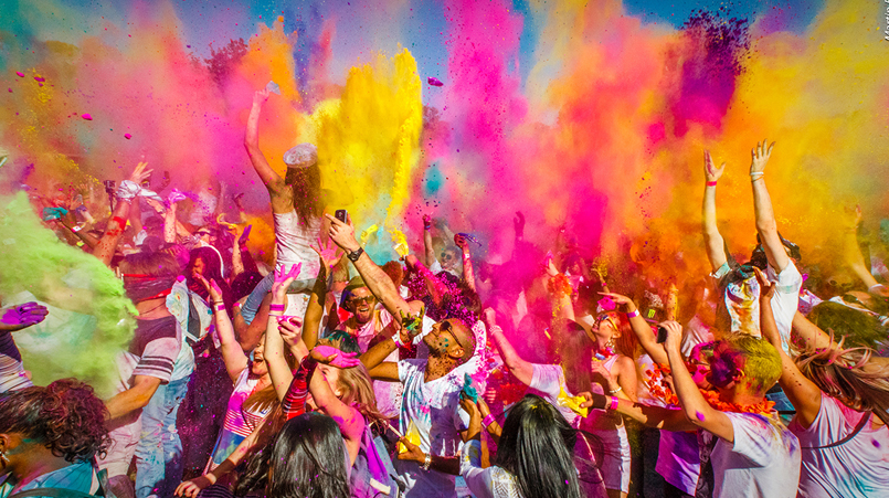 alt="Varanasi Celebrates Holi with Colors and Music"