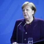 alt="Merkel Dismisses Cover-Up Claims Regarding Suppression of COVID-19 Origins Report"