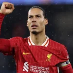 alt="Liverpool Need to Steel Themselves for Battle in PSG Return Leg, Warns Van Dijk"