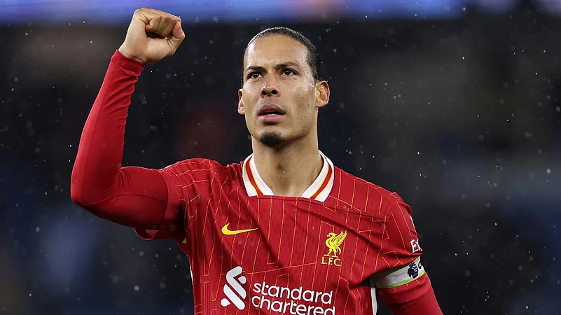 alt="Liverpool Need to Steel Themselves for Battle in PSG Return Leg, Warns Van Dijk"