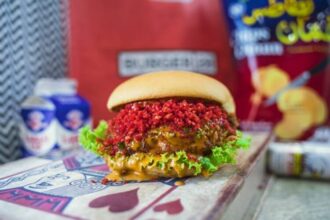 alt="Dubai Residents Line Up for One-Day Secret Burger Pop-Up Experience"