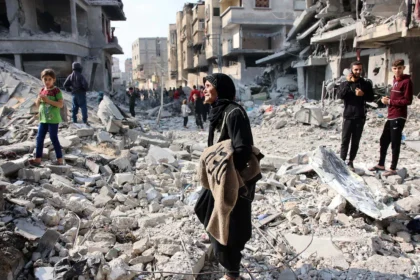 alt="Israeli Air Strike Kills 11 in Gaza, Including Children, Say Rescuers"