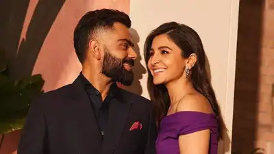 alt="Anushka Ignores Kohli’s Hand—Internet Explodes with Theories"