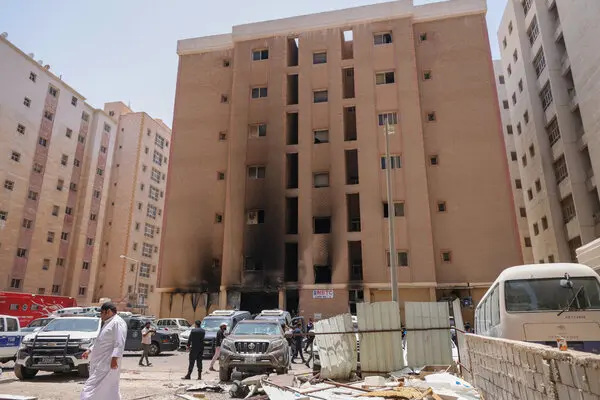 alt="Kuwait Court Convicts Nine in Deadly Fire Tragedy: Electrical Short Circuit Blamed for Migrant Worker Inferno"