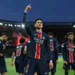 alt="PSG Edge Past Arsenal, on Brink of First Champions League Title{"