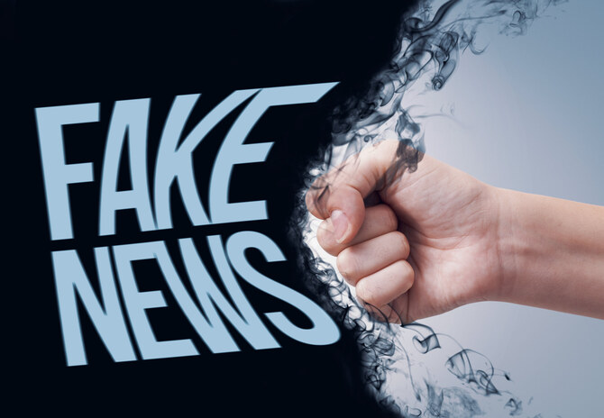 alt="Abu Dhabi Cracks Down on Fake News: Offenders Face Jail, Dh200K Penalty"