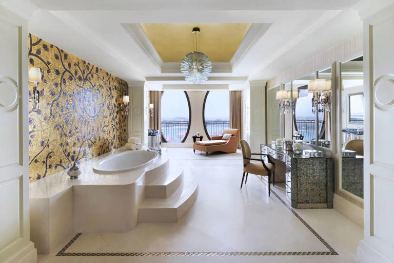 alt="Gold Towers & Golf Carts: Inside Trump's Lavish Ritz-Carlton Abu Dhabi Retreat"