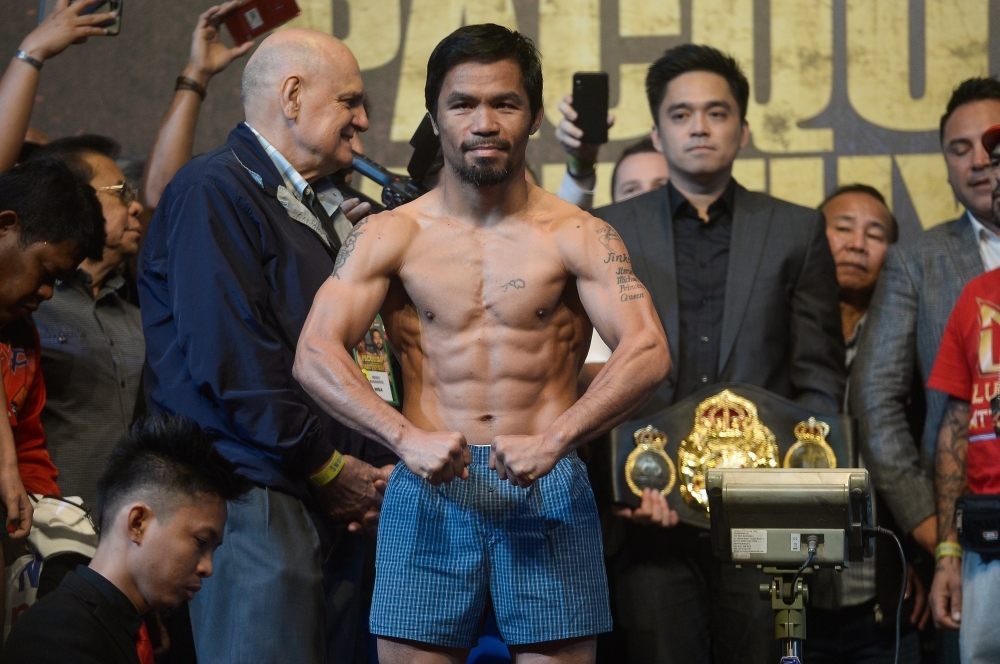 alt="Pacquiao Comes Out of Retirement to Fight Barrios for Welterweight Title"