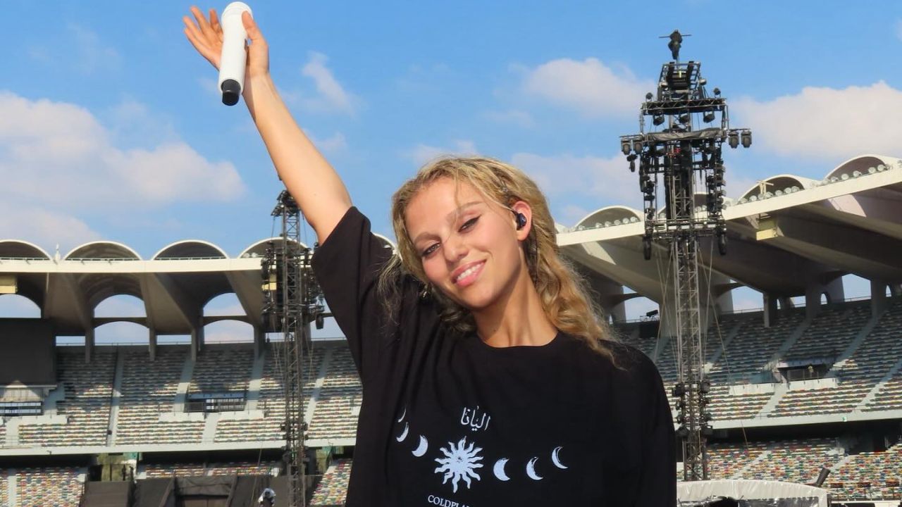 alt="Elyanna Supports Post Malone at Thrilling Abu Dhabi Grand Prix 2025 Performance"