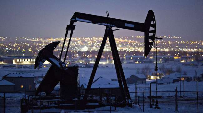 alt="Oil Prices Drop After Short-Lived Jump"