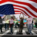 alt="80% of Americans believe that immigration is beneficial"