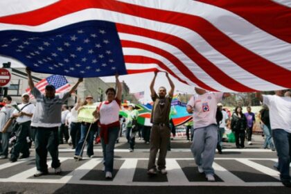 alt="80% of Americans believe that immigration is beneficial"