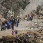 alt="Israeli Strikes Kill 20 at Gaza Aid Site, Increasing Death Toll"