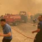 alt="As Turkey's wildfires rage, more than 50,000 people have been evacuated"