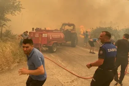 alt="As Turkey's wildfires rage, more than 50,000 people have been evacuated"