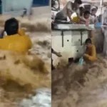 alt="India Floods: Hotel Worker Rescues Man Swept Away in Rajasthan Floodwater"
