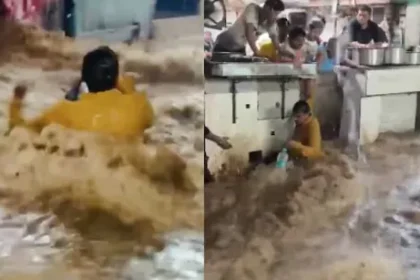 alt="India Floods: Hotel Worker Rescues Man Swept Away in Rajasthan Floodwater"