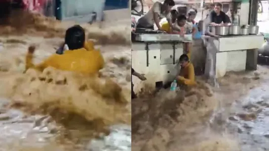alt="India Floods: Hotel Worker Rescues Man Swept Away in Rajasthan Floodwater"