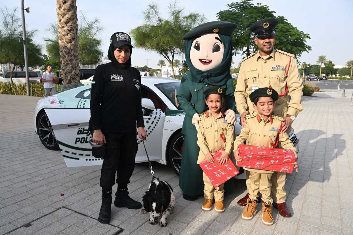 alt="Dubai Police Make Children Smile with a Sweet Event"
