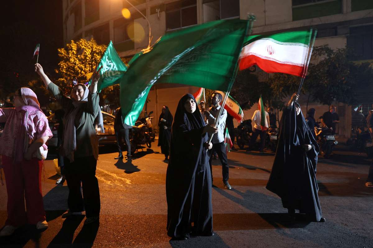 alt="Following Iran's attack on a US military base, Qatar calls on the public to report missile debris"