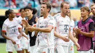alt="As PSG defeats Bayern in their Club World Cup match, Doue and Dembele shine"