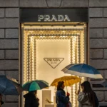 alt="pradas-1-37-billion-takeover-shakes-up-versace-and-luxury-fashion-industry"