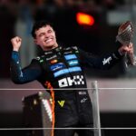 alt="lando-norris-celebrates-f1-title-in-abu-dhabi"