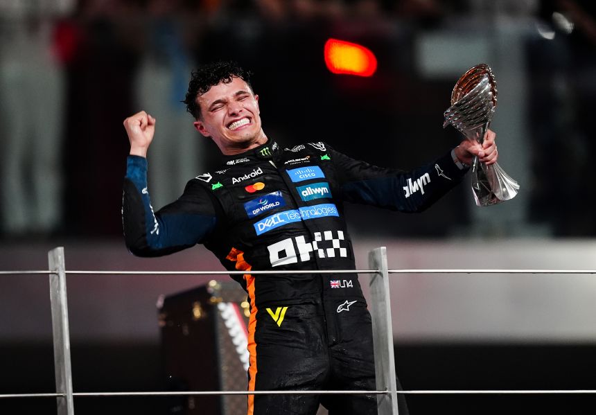 alt="lando-norris-celebrates-f1-title-in-abu-dhabi"