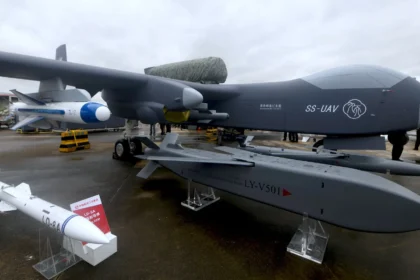 alt="chinas-sky-monster-giant-drone-carrier-jiu-tian-takes-first-flight"