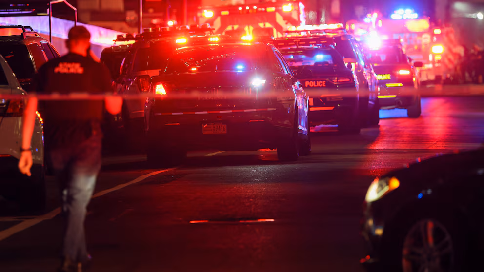 alt="person-of-interest-detained-vigil-after-mass-shooting-at-brown-university"