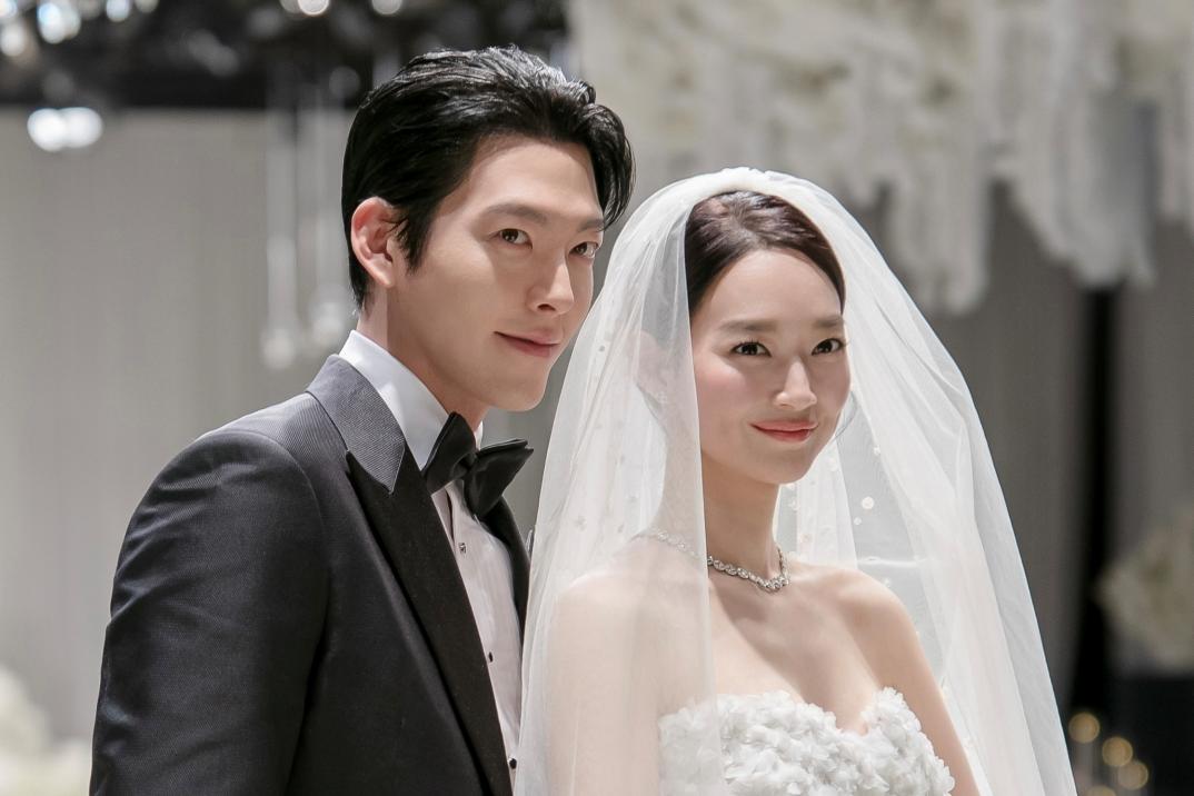 alt="kim-woo-bin-and-shin-min-ah-jet-off-for-spanish-honeymoon-agency-confirms-newlywed-status"