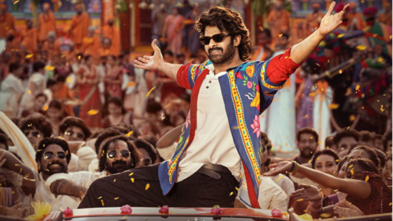 alt="raja-saab-first-day-first-show-reviews-may-not-bolster-prabhas-star-power-mixed-responses-for-horror-comedy"