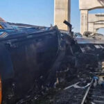 alt="crane-collapse-derails-train-in-thailand-killing-22-and-injuring-dozens"