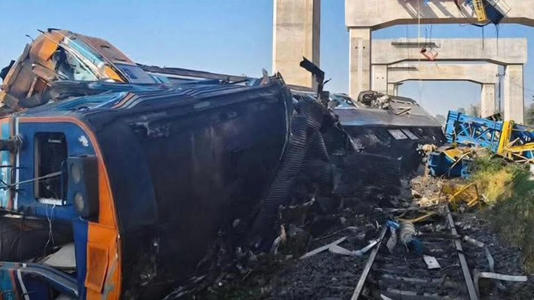 alt="crane-collapse-derails-train-in-thailand-killing-22-and-injuring-dozens"