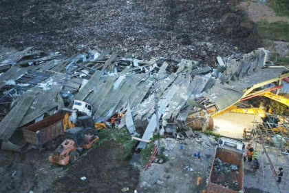 alt="one-dead-38-missing-after-philippine-dump-site-collapse"